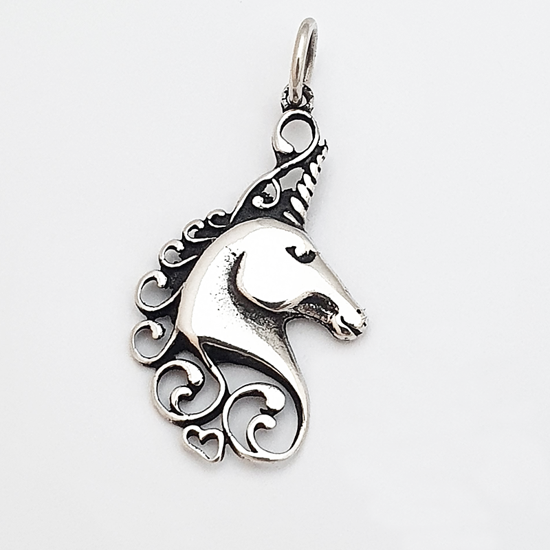 Silver pendant unicorn and heart Silver pendant unicorn and heart