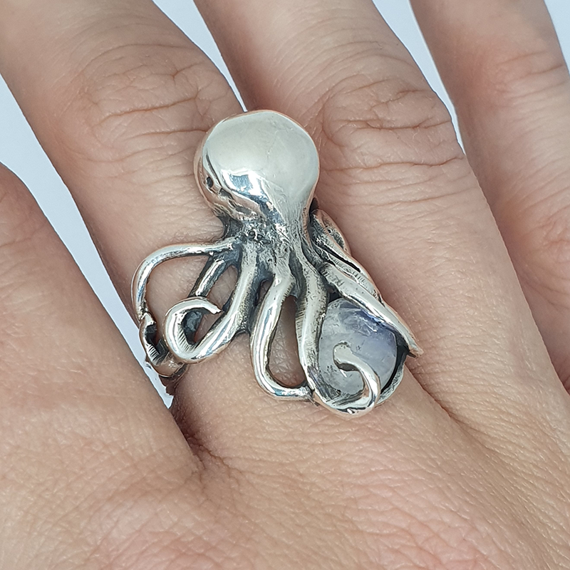 Handcrafted .925 Sterling Silver Octopus Clutching Lava Crystal Handcrafted .925 Sterling Silver Octopus Clutching Lava Crystal