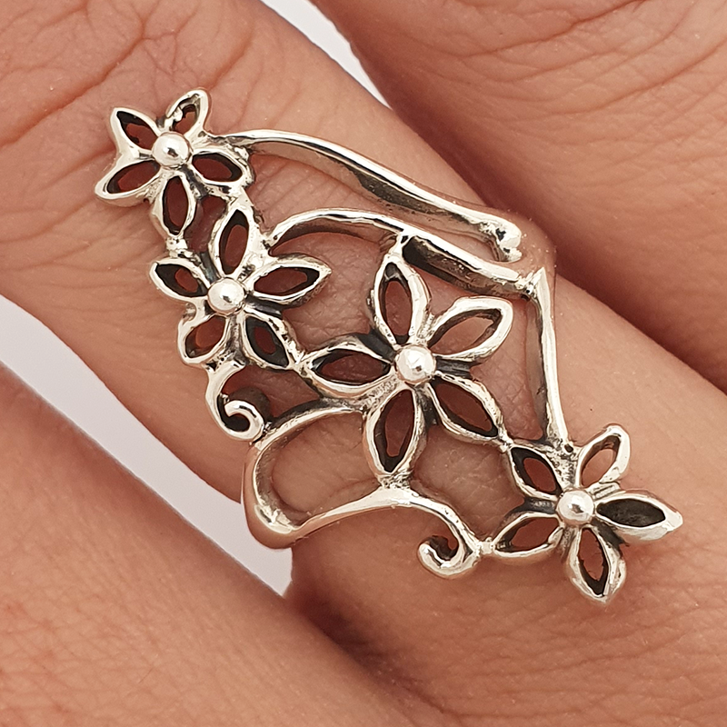 Long silver ring with flowers