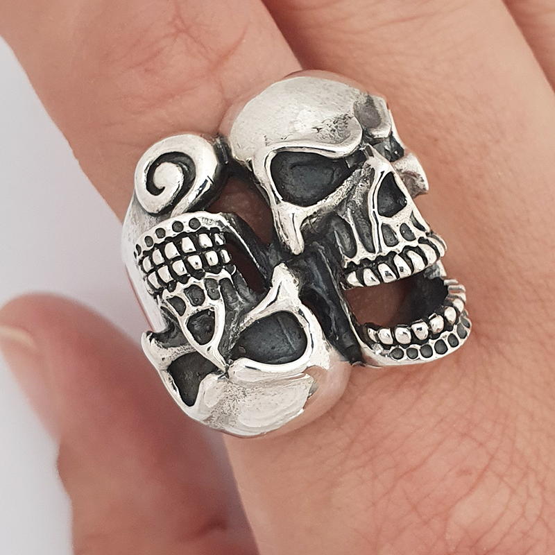 Silver ring heads death reversed Silver ring heads death reversed
