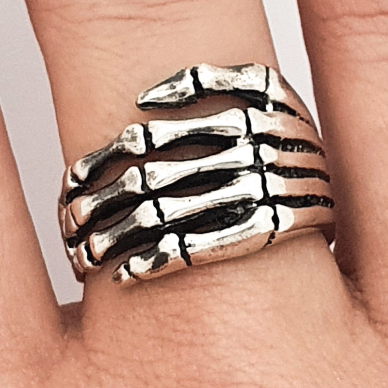 Men's Sterling Silver Skull Hand Ring - Jewelry1000.com | Sterling silver  mens, Mens sterling silver jewelry, Mens silver earrings