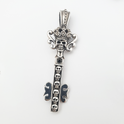 key and skulls silver pendant