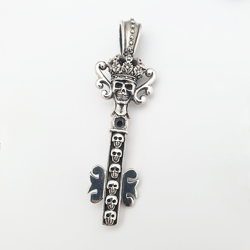 key and skulls silver pendant key and skulls silver pendant