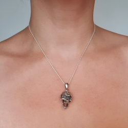 Pendentif tête de mort articulée