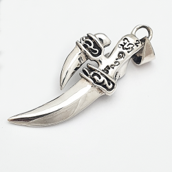 Dagger and skull pendant