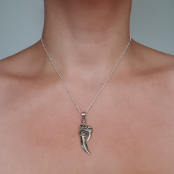 Dagger and skull pendant